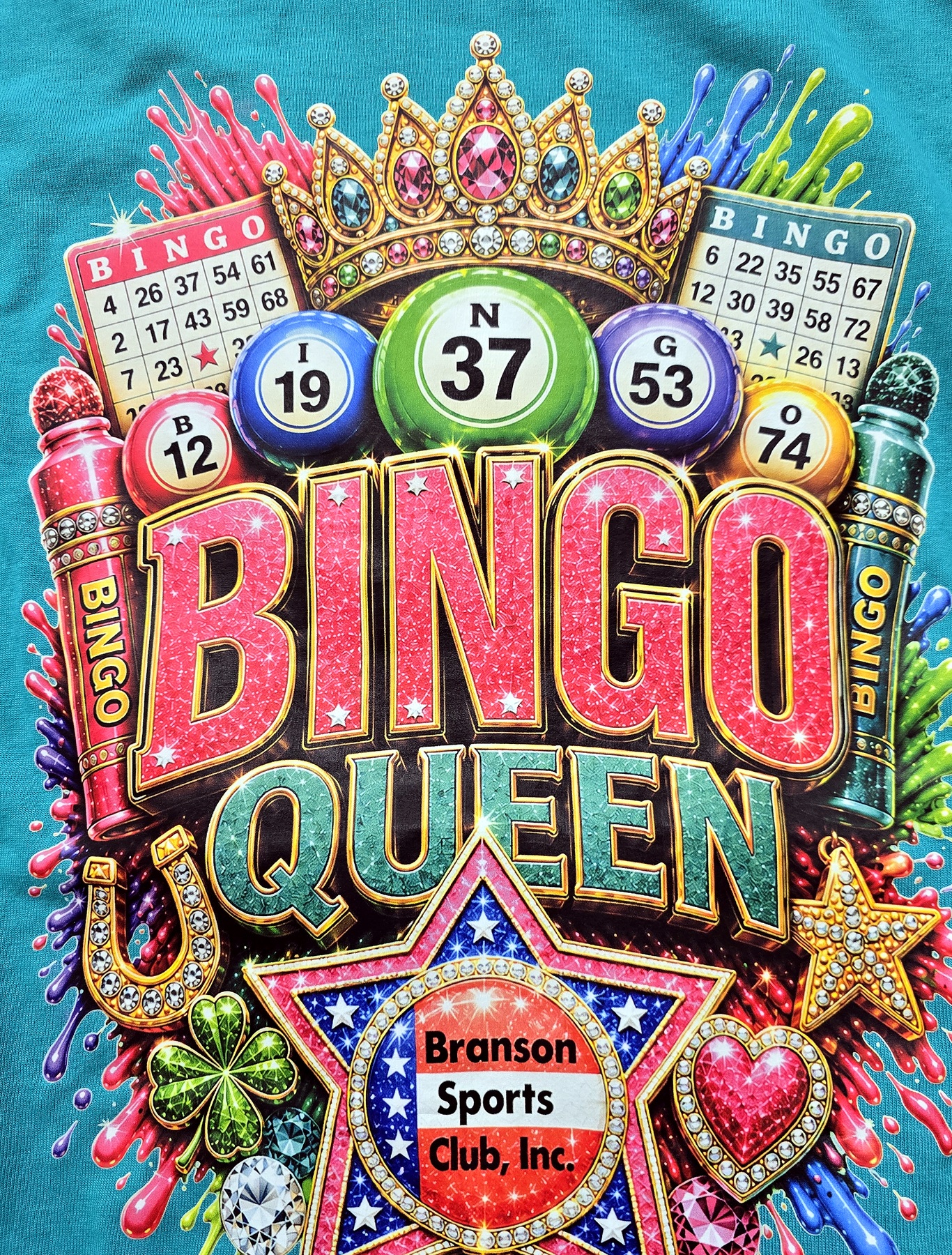 Bingo Queen photographed on turquoise shirt
